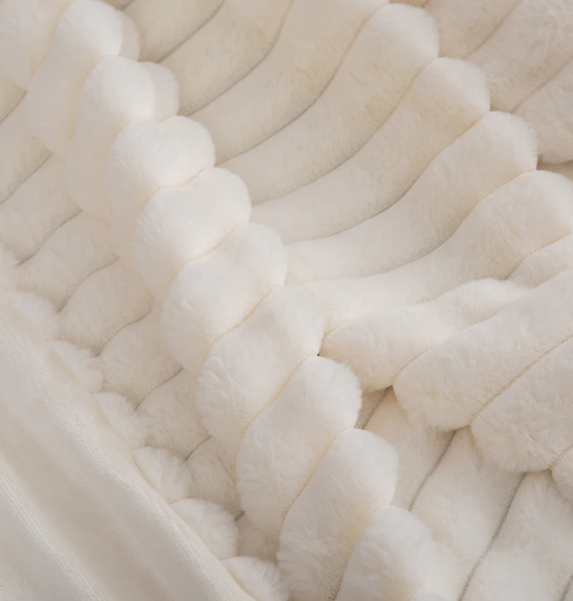 People and Pet throw!
XL Decadent faux-fur jacquard stripe throw.