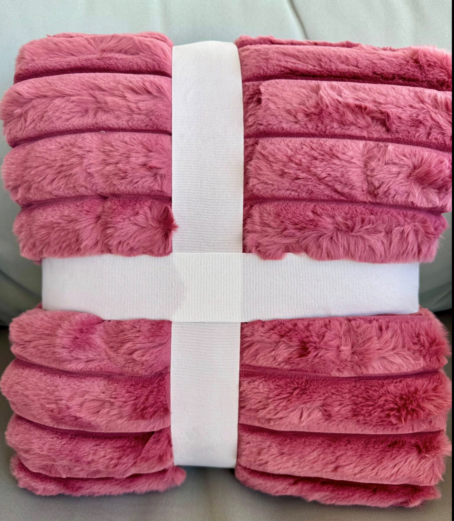 People and Pet throw!
XL Decadent faux-fur jacquard stripe throw.