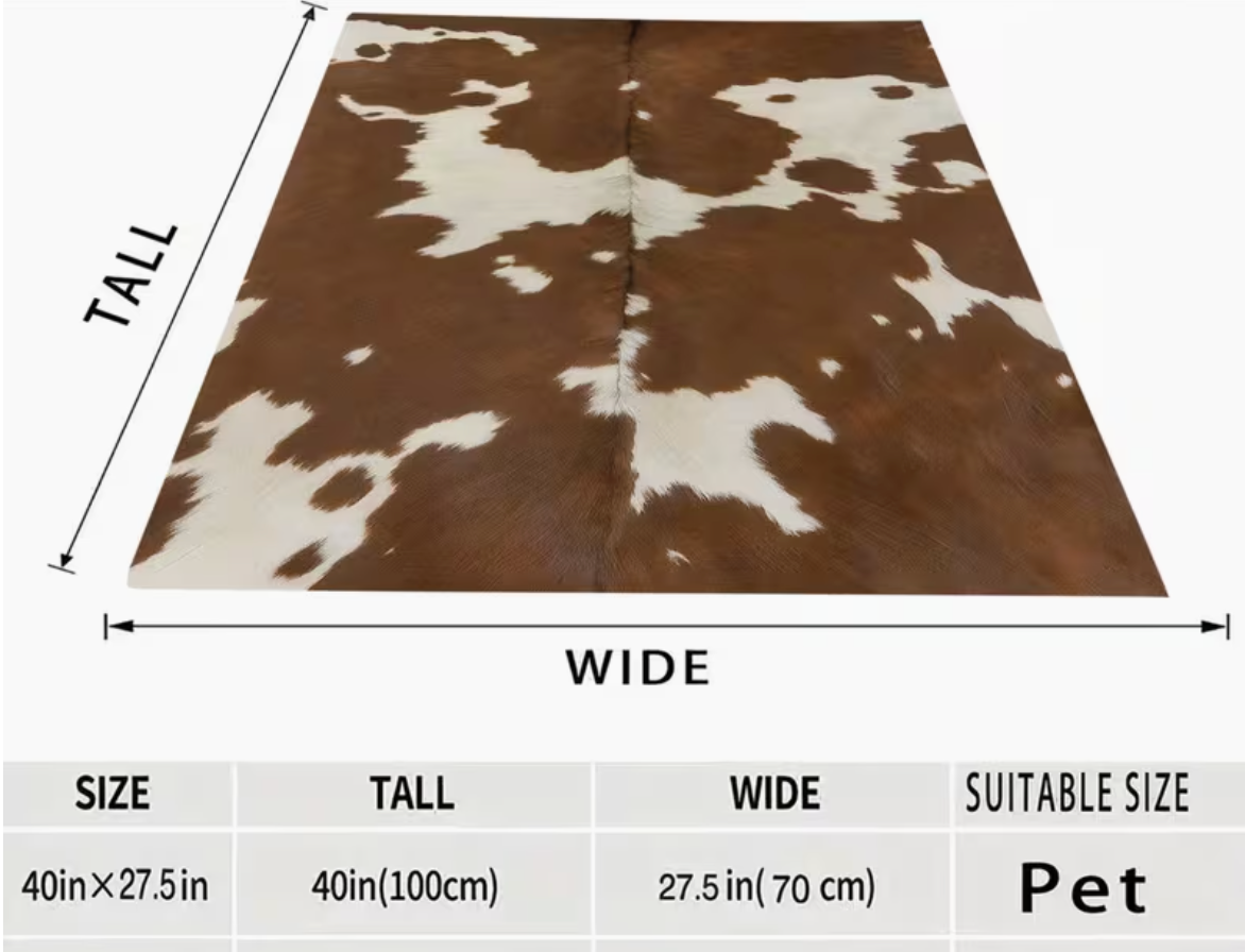 Cowhide print flannel pet blanket.