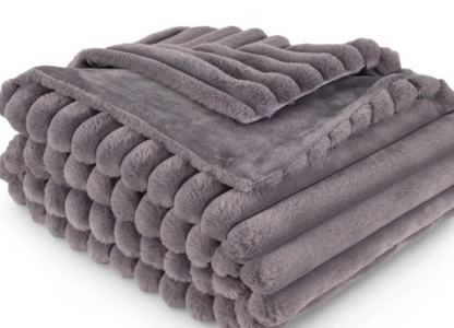 People and Pet throw! 
XL Decadent faux-fur jacquard stripe throw.